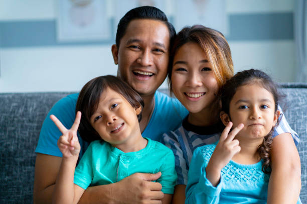 Portrait of a happy multi racial asian family